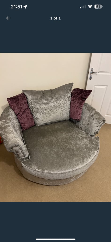 Swivel velvet armchair 