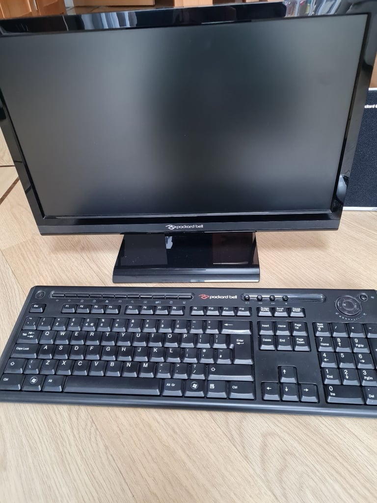 Computer monitor,  keyboard,  mouse and speakers 