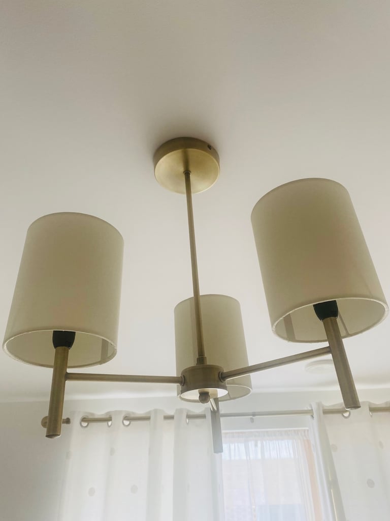 Pendant light with brass touch