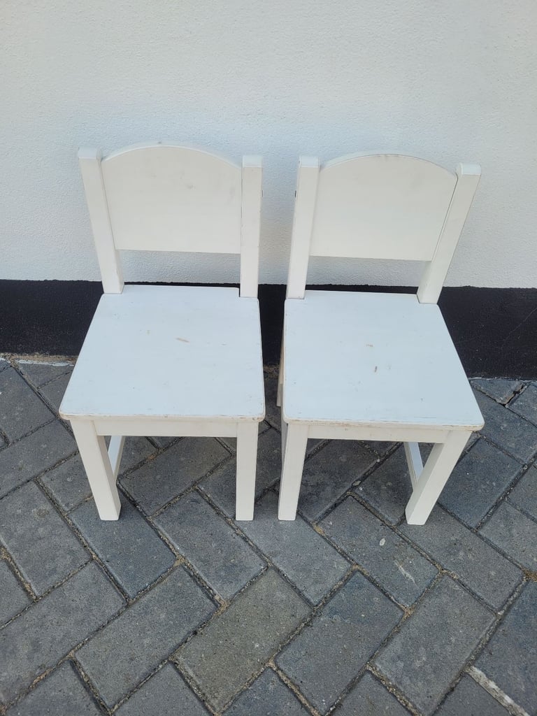 2 white Preschool Nursery school age wooden chairs