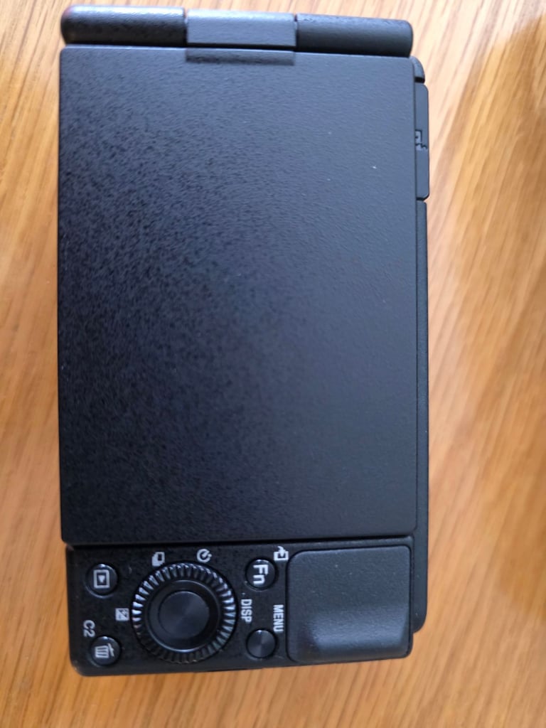 Sony ZV-1 vloggers camera with case, 4x batteries and  tripod camera grip