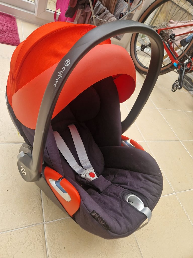 Cybex Black and Orange Cloud Z iSize baby car seat