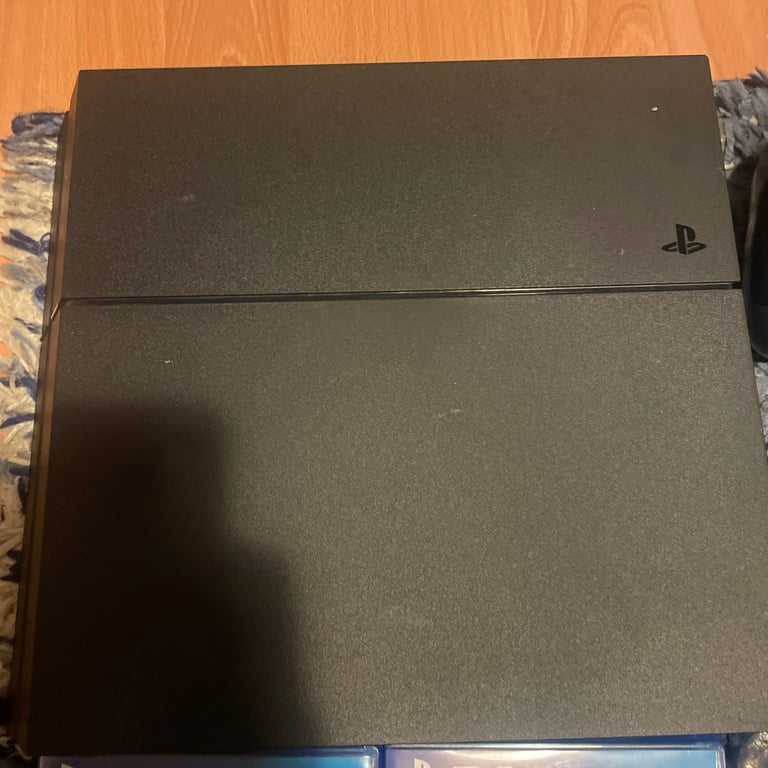 PS4 1TB model with controllers and The last of us bundle
