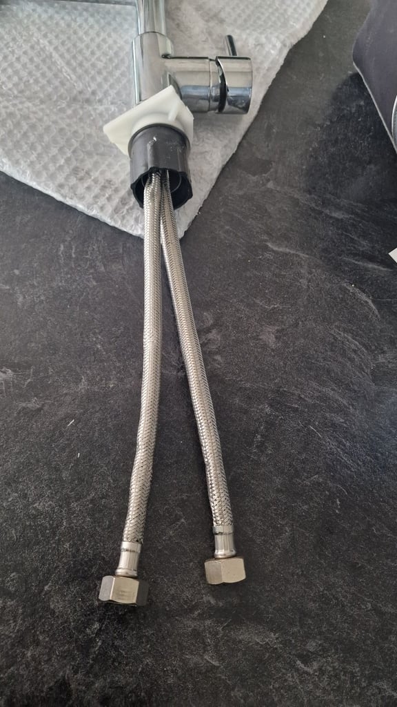 Large kitchen mixer tap with shower spray 