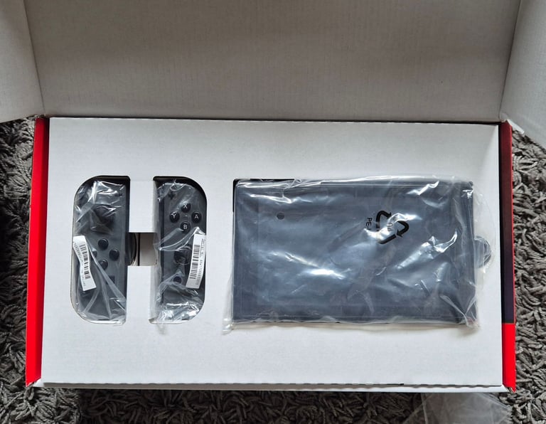 Nintendo Switch Grey with extra controller and 10 games.
