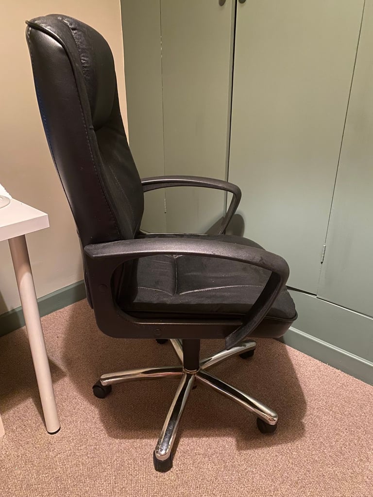 Black faux leather office chair with stainless steel legs bedroom study work from home