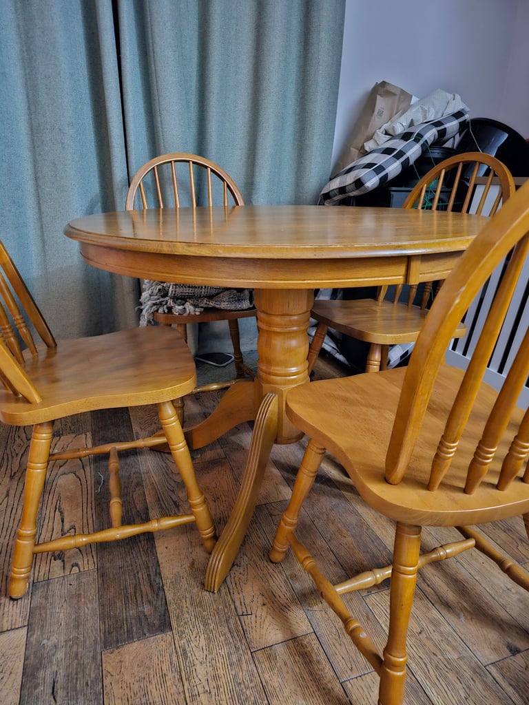image for Solid wood dining table with 4 chairs.