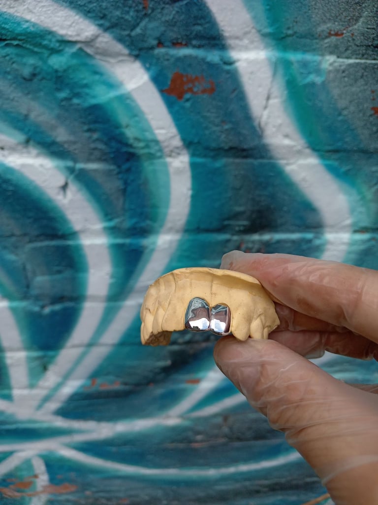 Custom made double cap silver grillz 