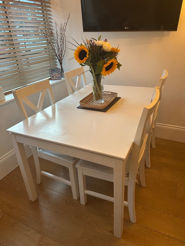 image for White Extendable Dining Table with 6 Chairs