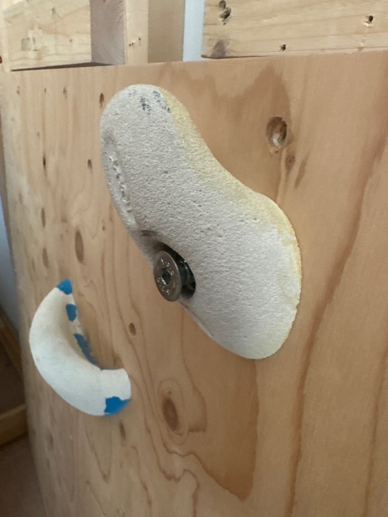 Climbing wall with 22 boulder holds