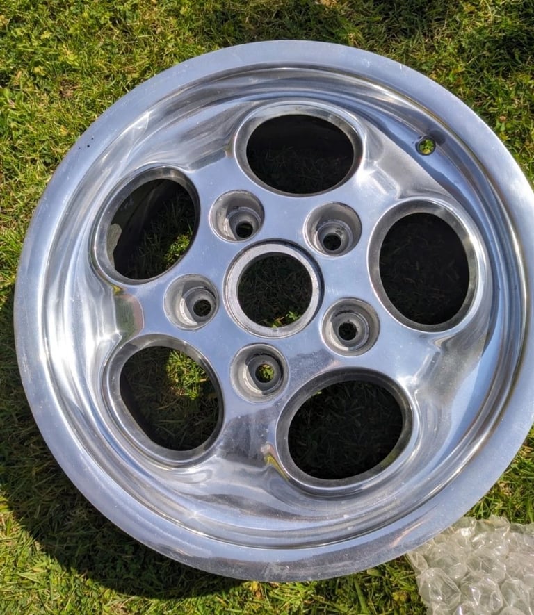 Set of 4 Porsche polished teledial wheels