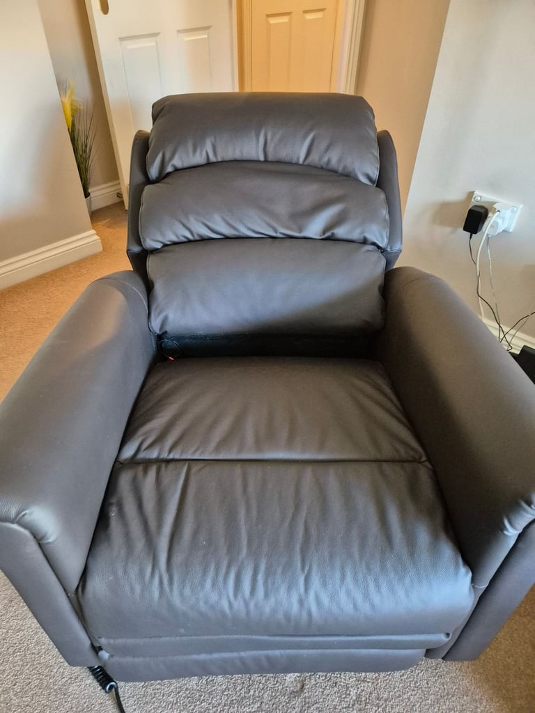 Careco electric riser/recliner brown leather chair 