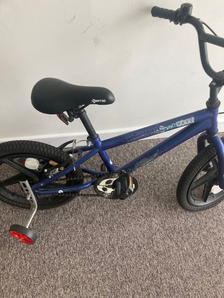 kids bike and two scooters 