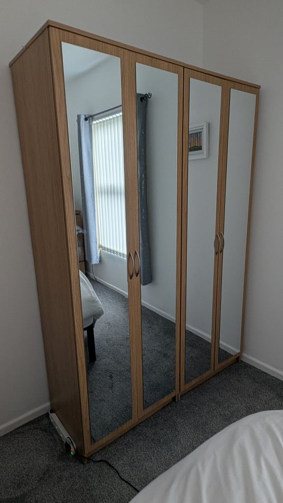 Two Oak Effect Mirrored Double wardrobes