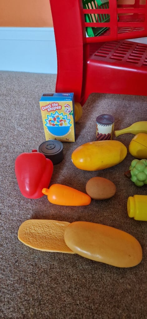  PLASTIC SHOPPING TROLLEY WITH GROCERIES. EXCELLENT CONDITION.