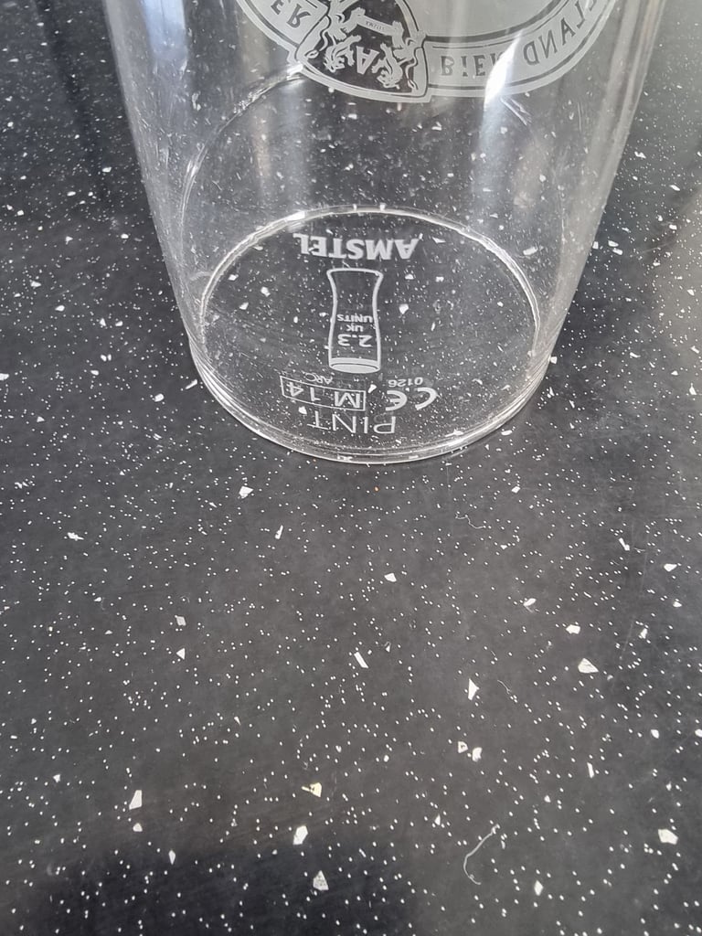 Brand new amstel bier pint glass 