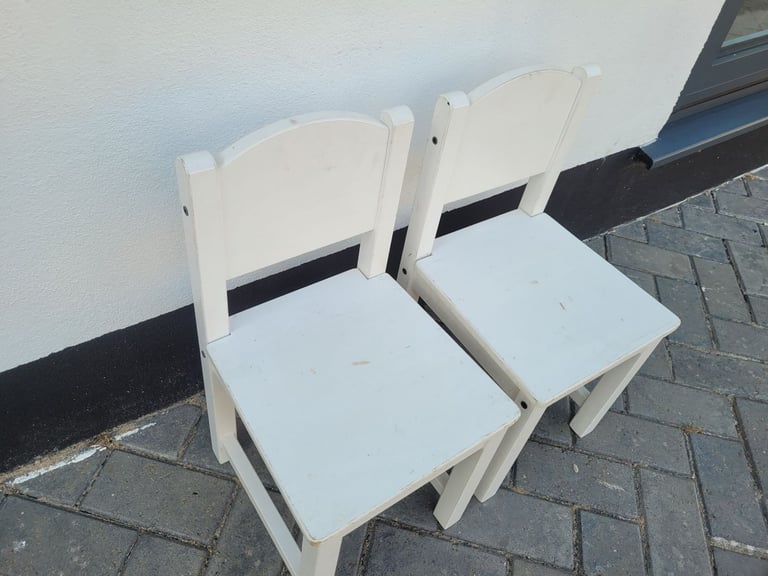 2 white Preschool Nursery school age wooden chairs