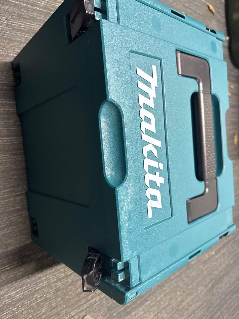 Makita Power Drill, box and charging dock 