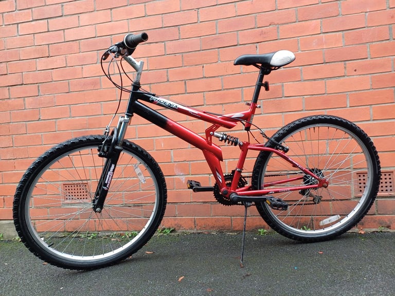 Bentini Phoenix Mountain , City Bike - full suspension , comfortable seat , good brakes .