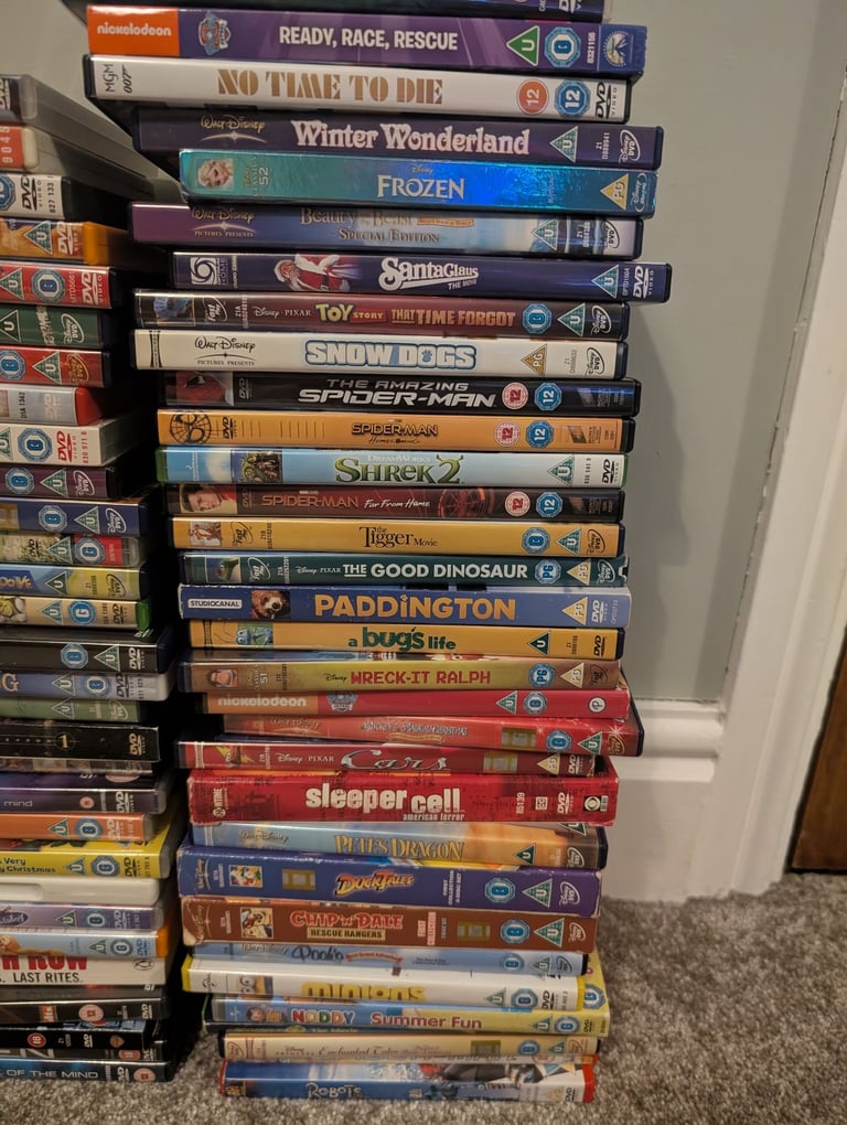 image for Job Lot DVDs, one book, Disney, Kids, Adults