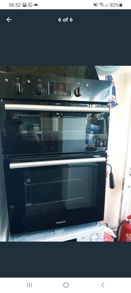Hotpoint black electric built in oven almost new free delivery could connect it  