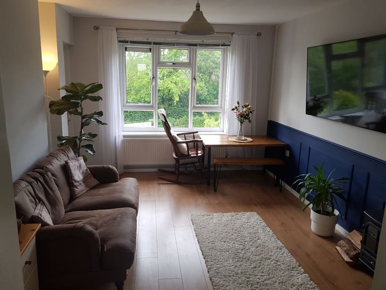 Sunny, spacious room with office space