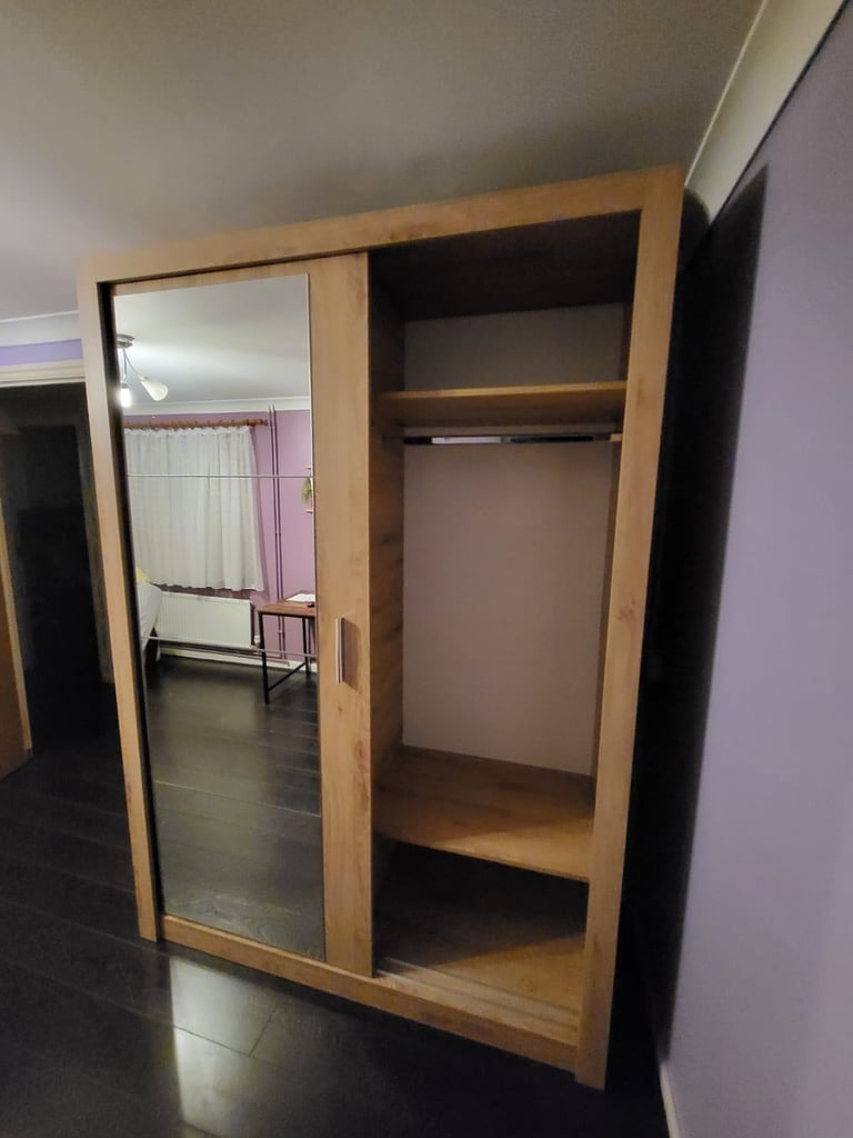 Large double wardrobe with mirror panel