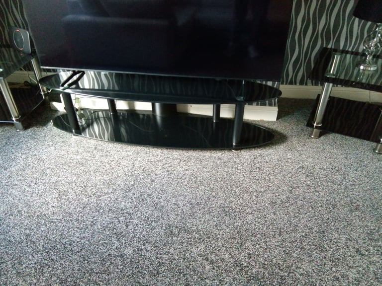 image for Black glass tv stand quick sale 