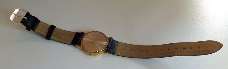 UNISEX QUARTZ WATCH WITH GOOD QUALITY BLACK LEATHER STRAP. G.W.O.