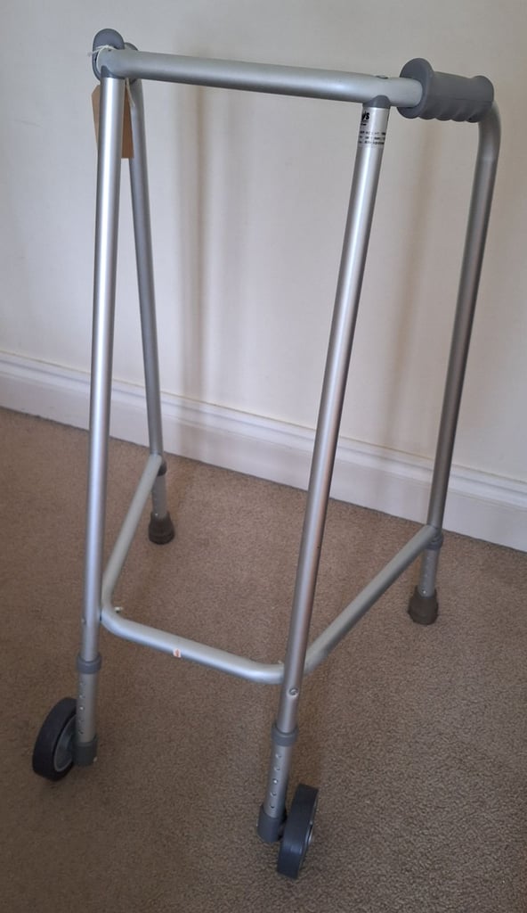 image for Walking frame with wheels in excellent condition