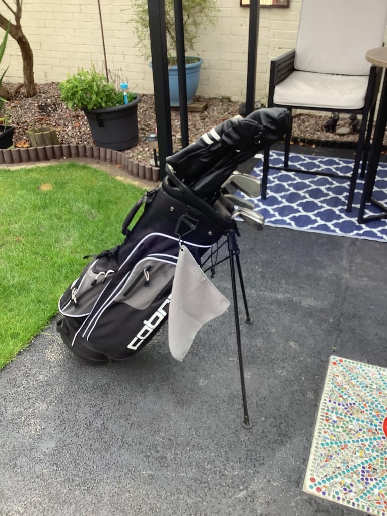 Set of Ladies King Cobra SSi graphite golf clubs, in a lovely King Cobra golf bag/stand.