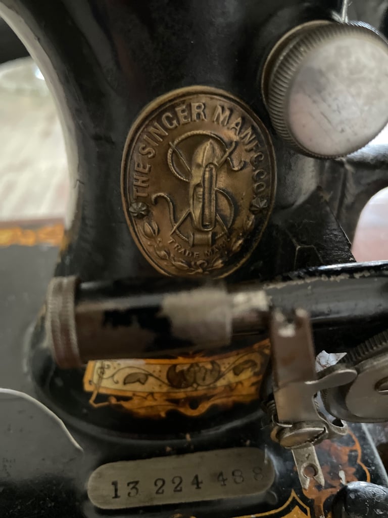 Vintage hand cranked singer sewing machine 