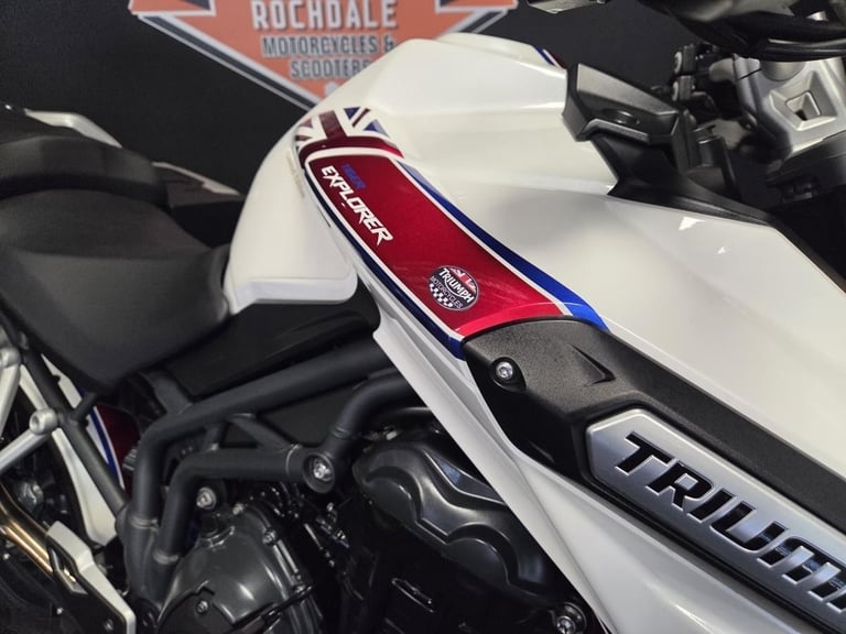 2013 Triumph Tiger Explorer 1215 in white with luggage.