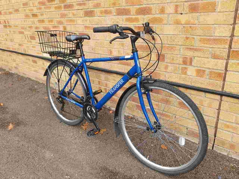 Lightweight Aluminium Apollo Transfer Hybrid bike in good condition with rear basket