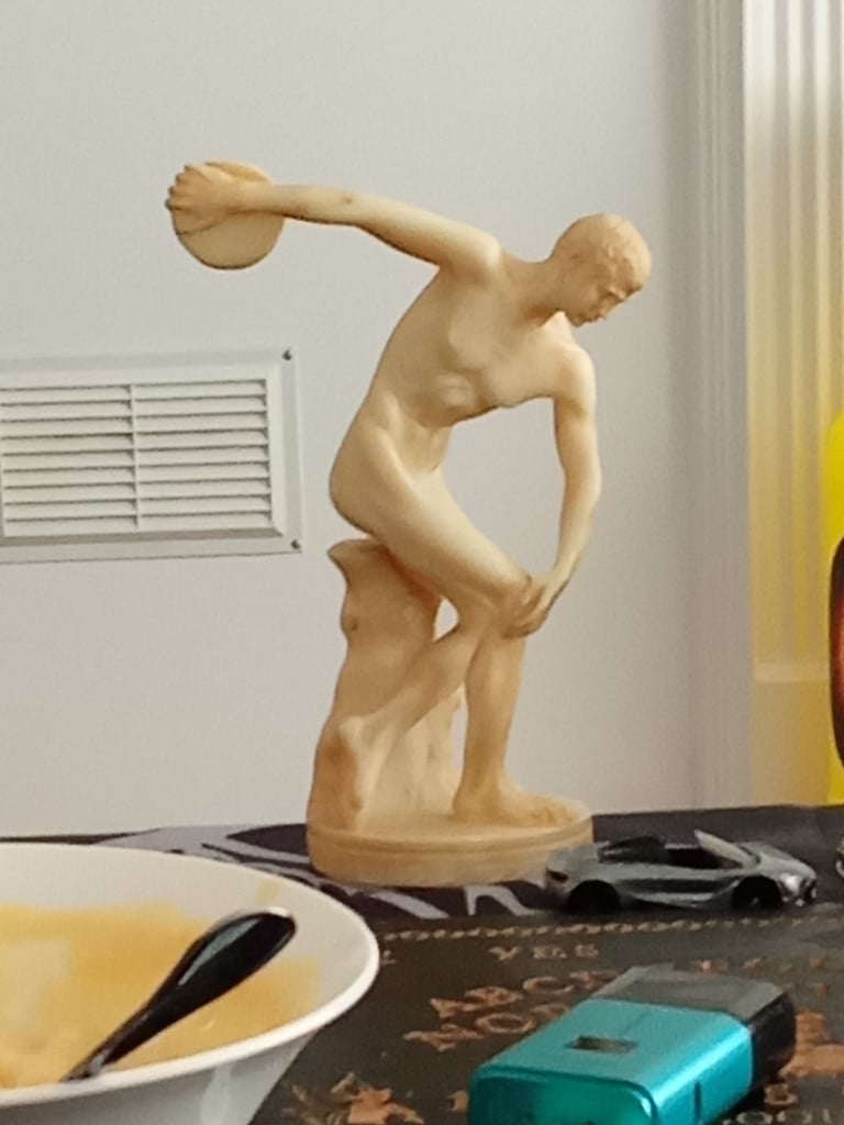 image for Greek sculpture ornament discobolus 