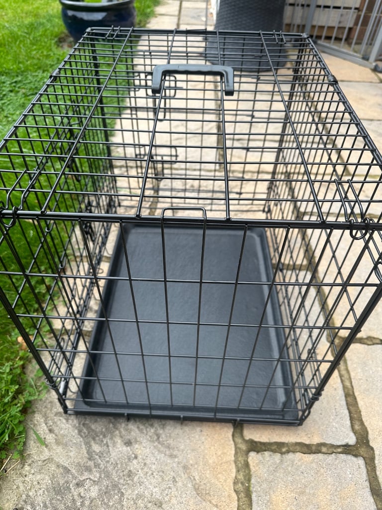 Lovely black dog crate for small/toy dog.