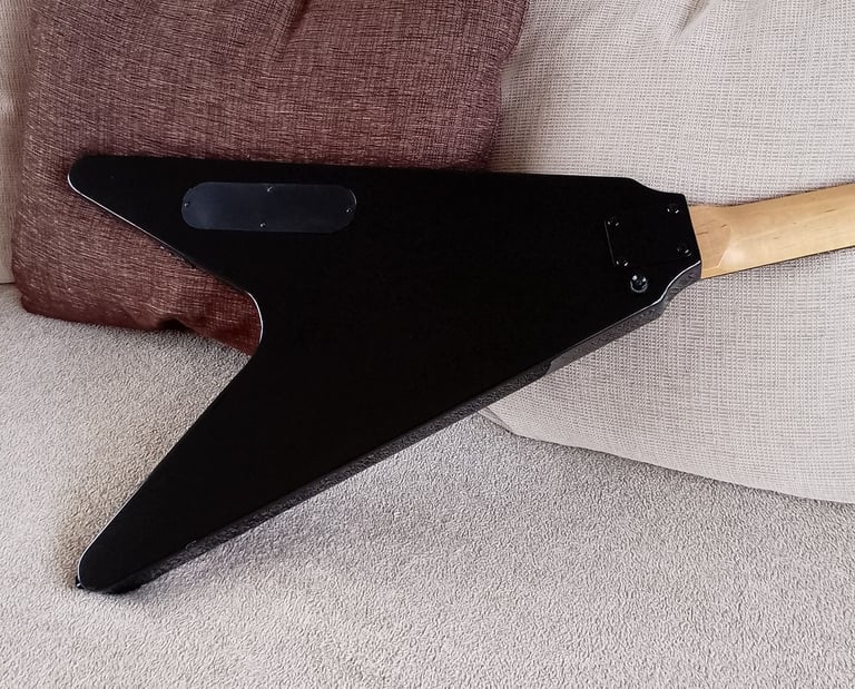 Iconic Flying V Bass Guitar, Plays And Sounds Really Well, Good Condition.