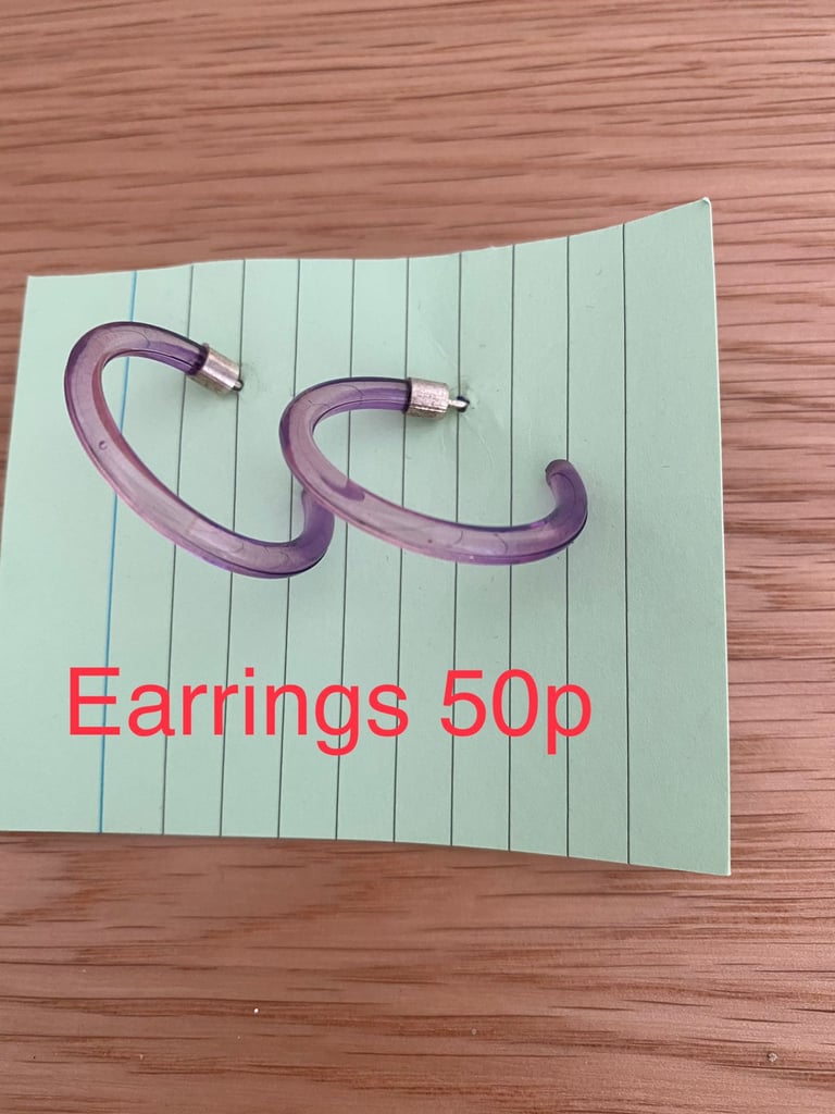 Selection of earrings and costume jewelry. 