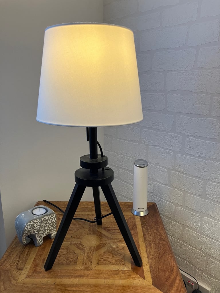 Tripod table and floor lamps.  