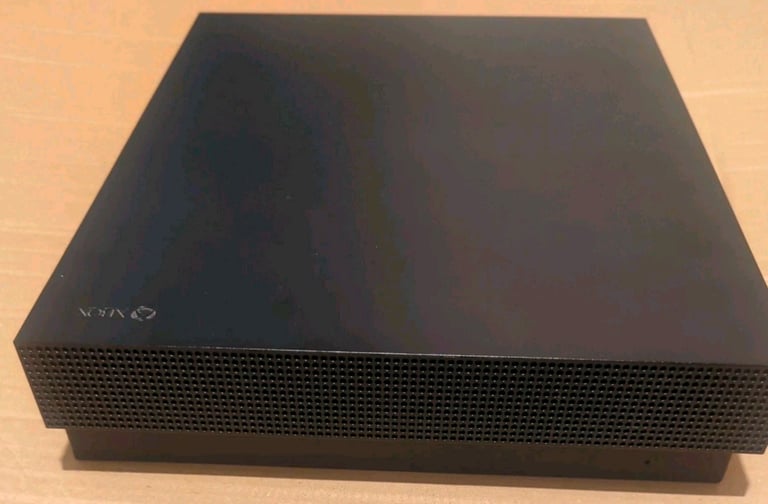 Xbox one X 4K console 1TB + games (no controller)