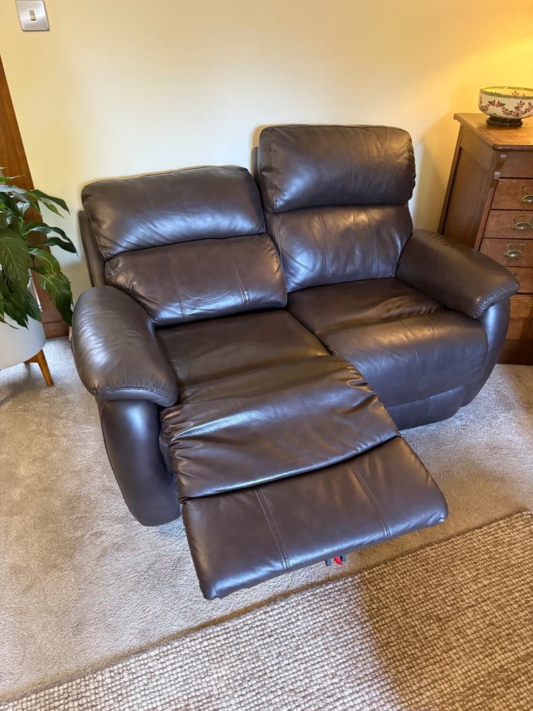 Leather two seater reclining sofa
