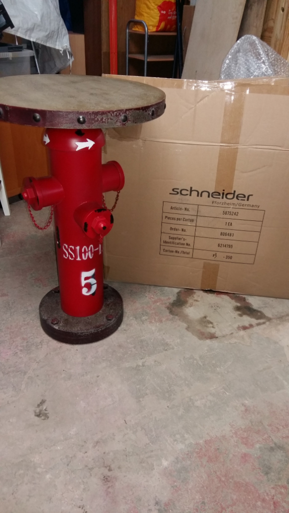 red metal fire hydrant table with round wood top still in box 