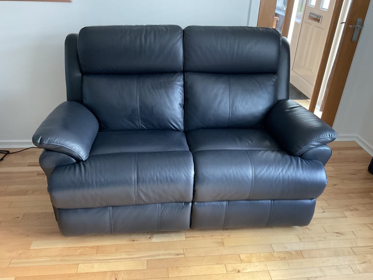 REDUCED PRICE    NEW 2 x 2 seater leather sofas 1 of which is a power recliner