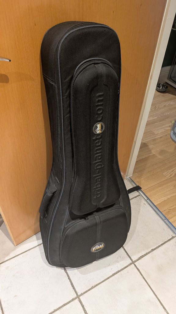 image for Tribal planet acoustic guitar case. 