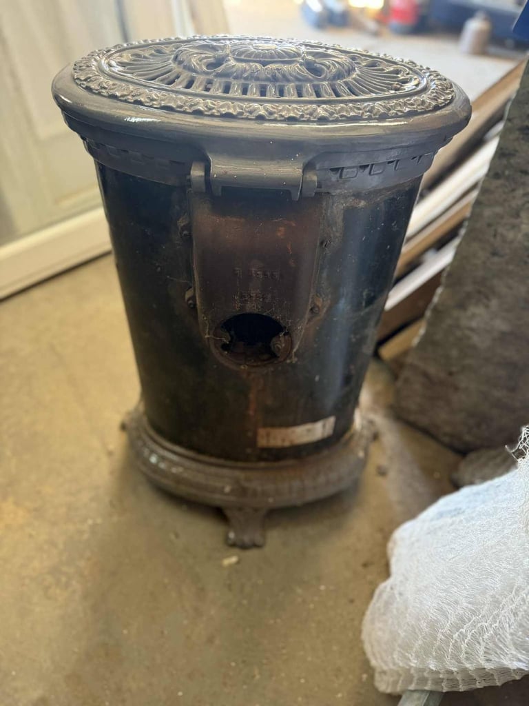 Secondhand Cast Iron Wood / Coal Burning Stove