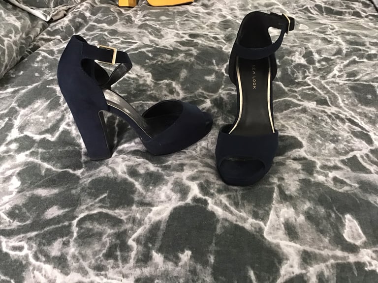 BNWOT Navy peep toe sandal, size 5.