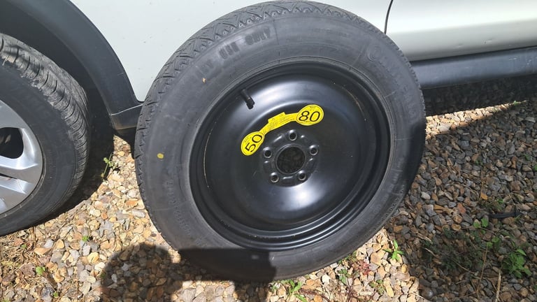 Ford 16 inch 5 stud space saver wheel 