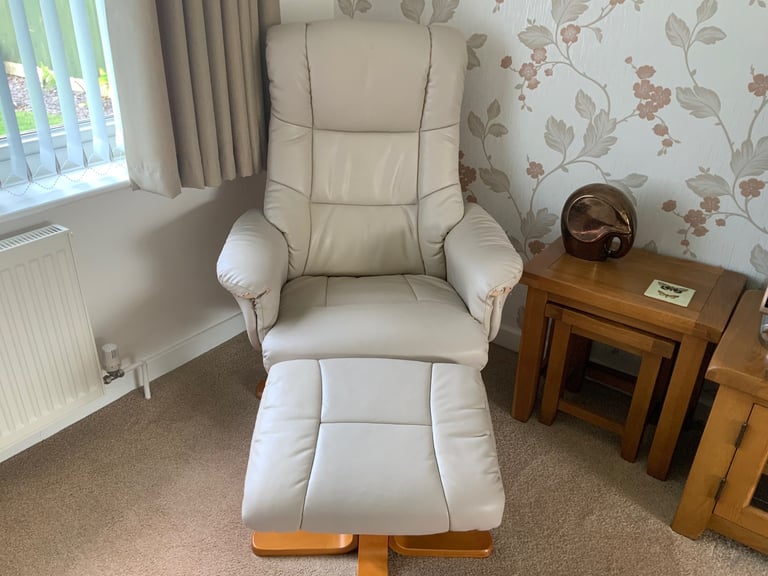 image for Aldis beige leather swivel recliner and matching stool