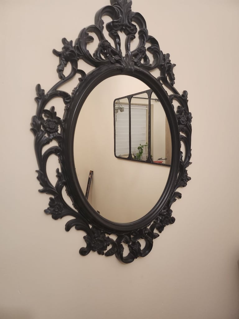 Black Baroque style mirror