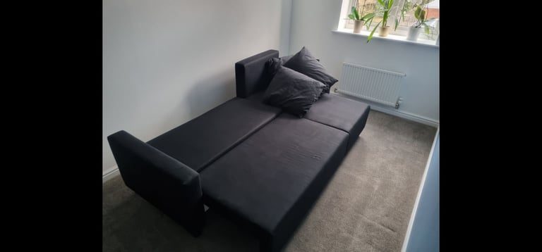 Black Ikea corner sofa bed